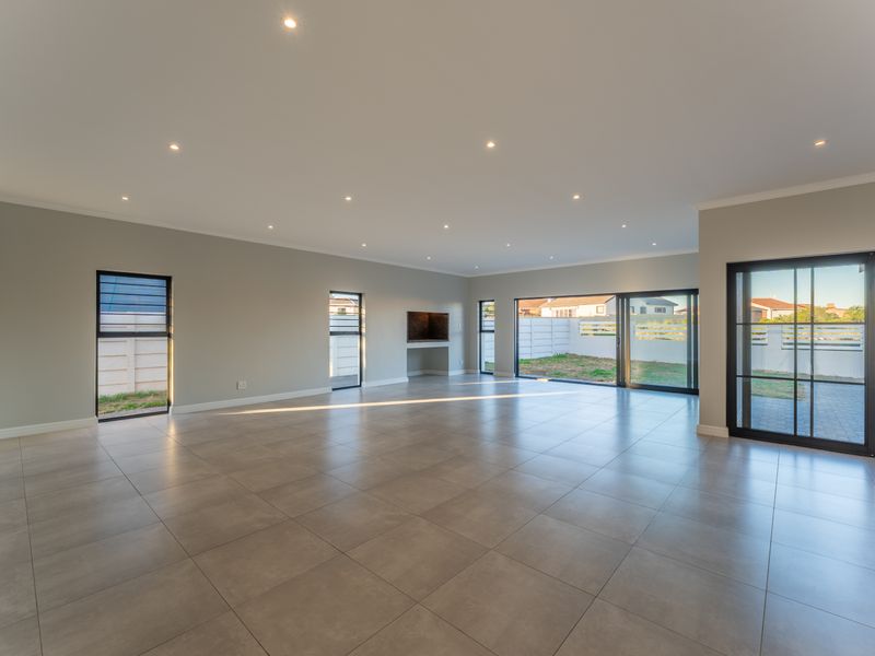 Stylish Newly Built Home with Modern Finishes & Greenbelt Views - Photo 8