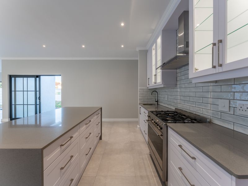 Stylish Newly Built Home with Modern Finishes & Greenbelt Views - Photo 5