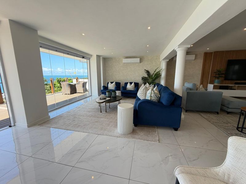 Exclusive Dual-Residence Coastal Retreat with Panoramic Ocean Views - Photo 4