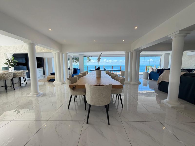 Exclusive Dual-Residence Coastal Retreat with Panoramic Ocean Views - Photo 9