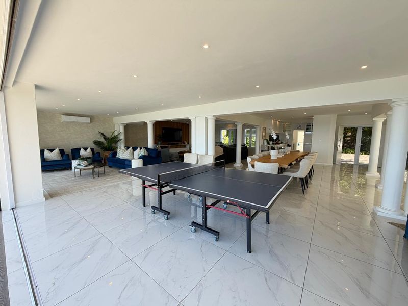 Exclusive Dual-Residence Coastal Retreat with Panoramic Ocean Views - Photo 8