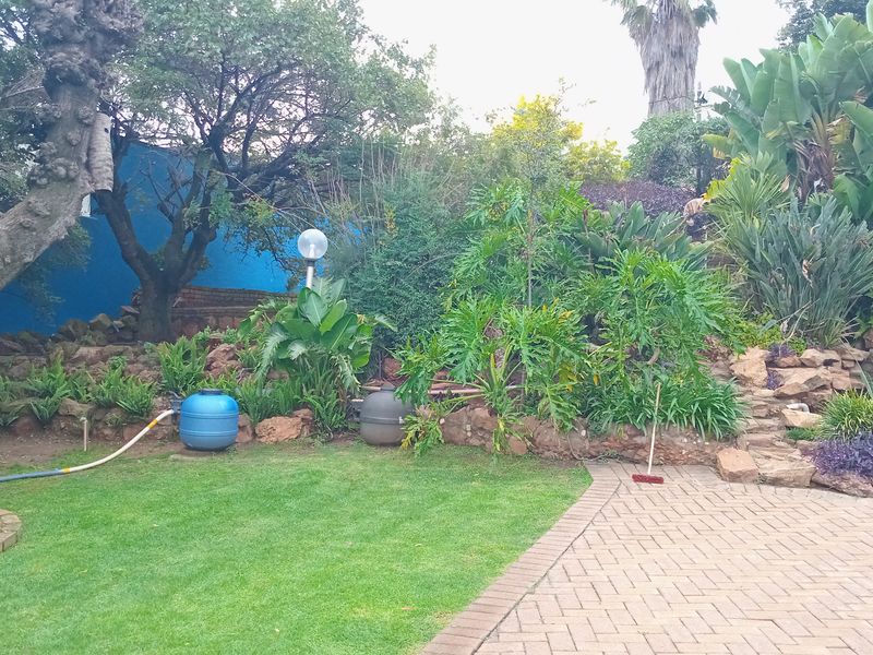 This lovely family home offers a perfect blend of comfort, space, and versatile living. - Photo 2