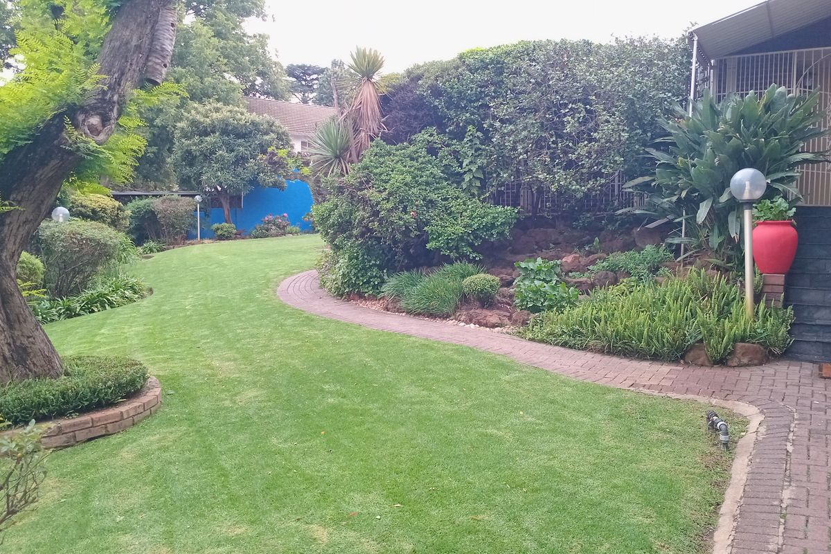 This lovely family home offers a perfect blend of comfort, space, and versatile living. - Photo 5