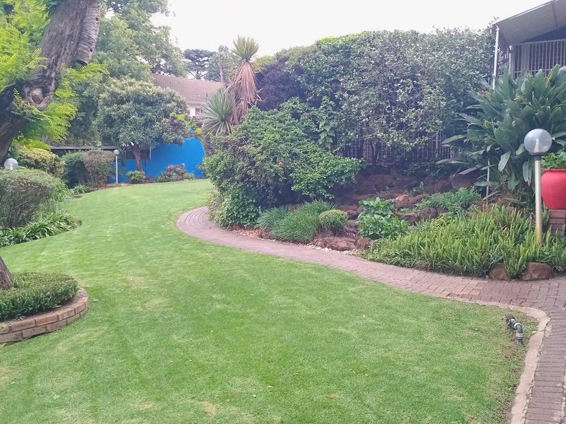 This lovely family home offers a perfect blend of comfort, space, and versatile living. - Photo 5