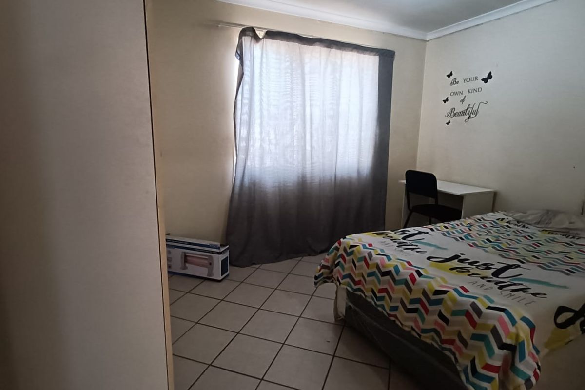 Smart Investment Opportunity – 4 Bedroom Home with Extras! - Photo 2