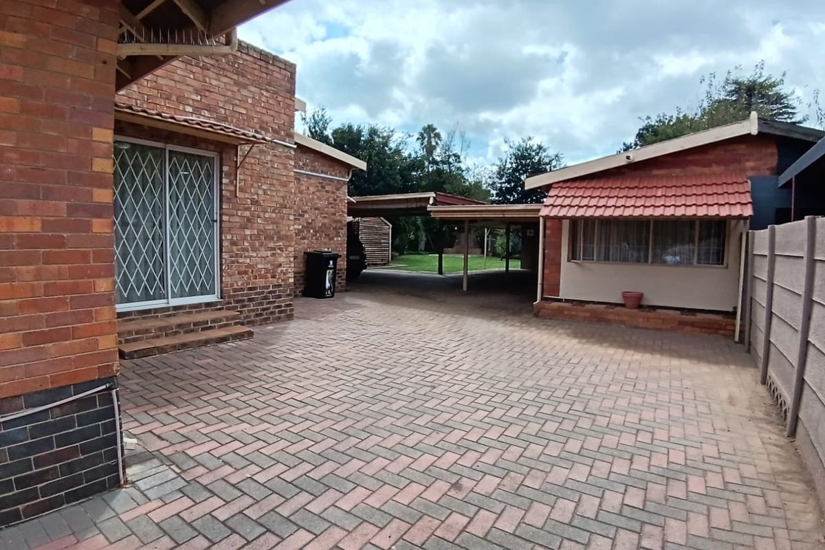 Stunning 4- Bedroom Home with Modern Finishes & Income -Generating - Photo 3