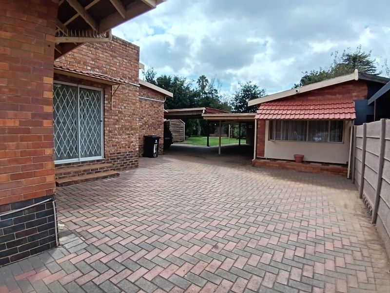 Stunning 4- Bedroom Home with Modern Finishes & Income -Generating - Photo 3