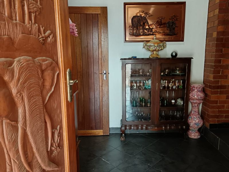 Stunning 4- Bedroom Home with Modern Finishes & Income -Generating - Photo 7