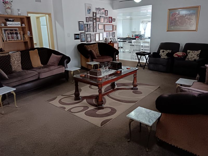 Stunning 4- Bedroom Home with Modern Finishes & Income -Generating - Photo 8