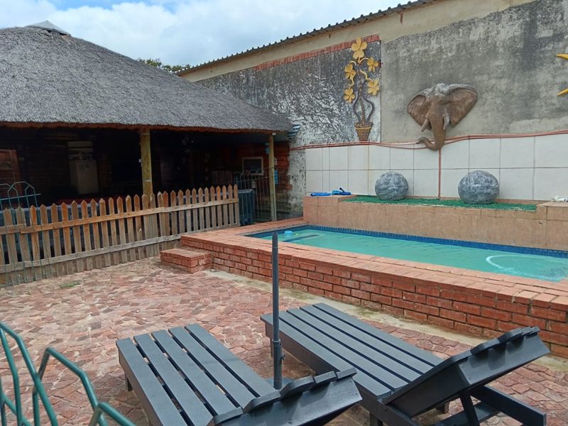 Stunning 4- Bedroom Home with Modern Finishes & Income -Generating - Photo 6