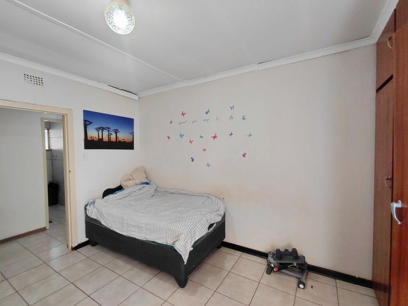 Spacious 4-Bedroom Home with Great Potential & Large Yard - Photo 10