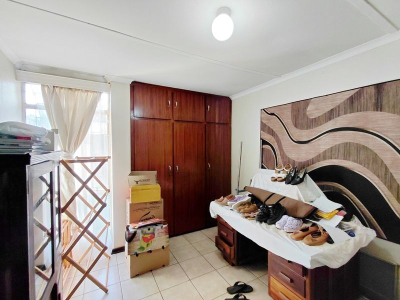 Spacious 4-Bedroom Home with Great Potential & Large Yard - Photo 9