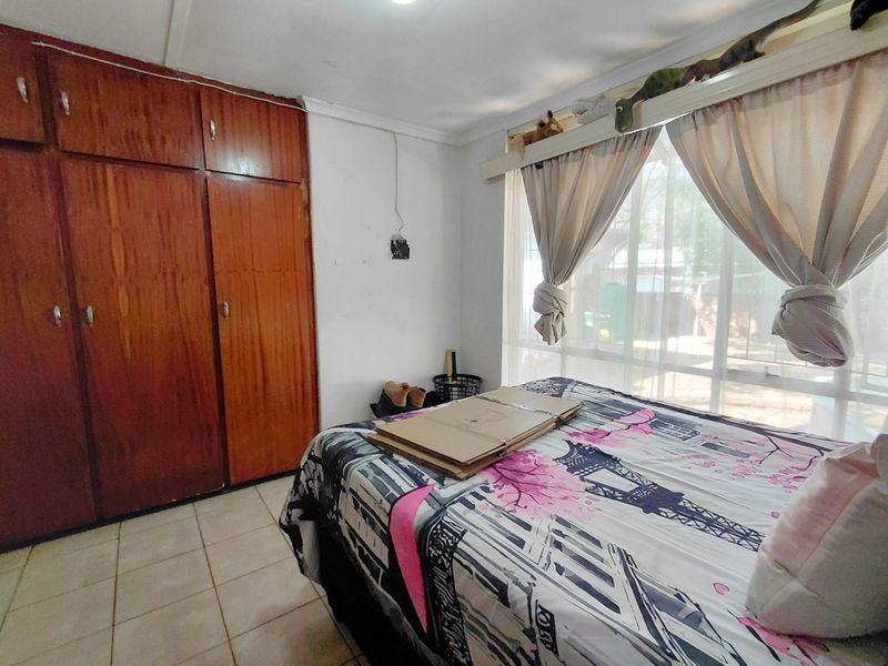 Spacious 4-Bedroom Home with Great Potential & Large Yard - Photo 8