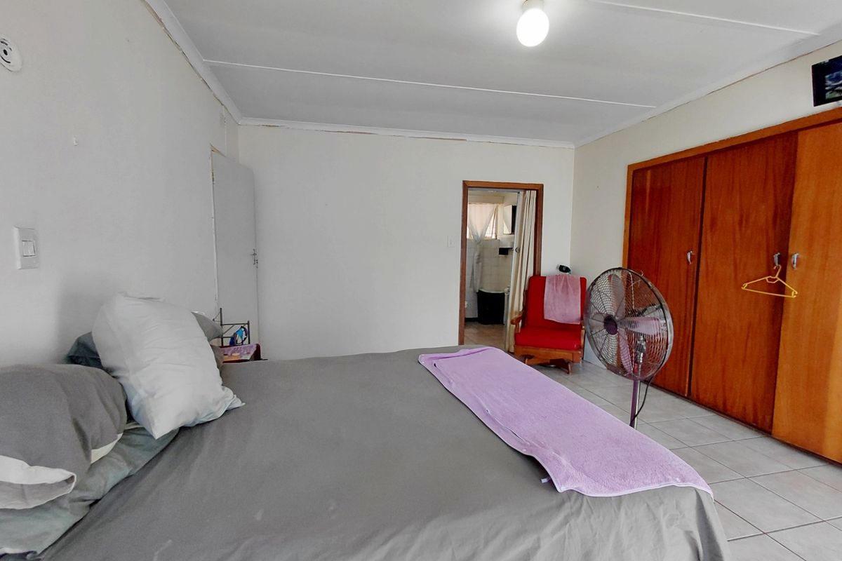 Spacious 4-Bedroom Home with Great Potential & Large Yard - Photo 5