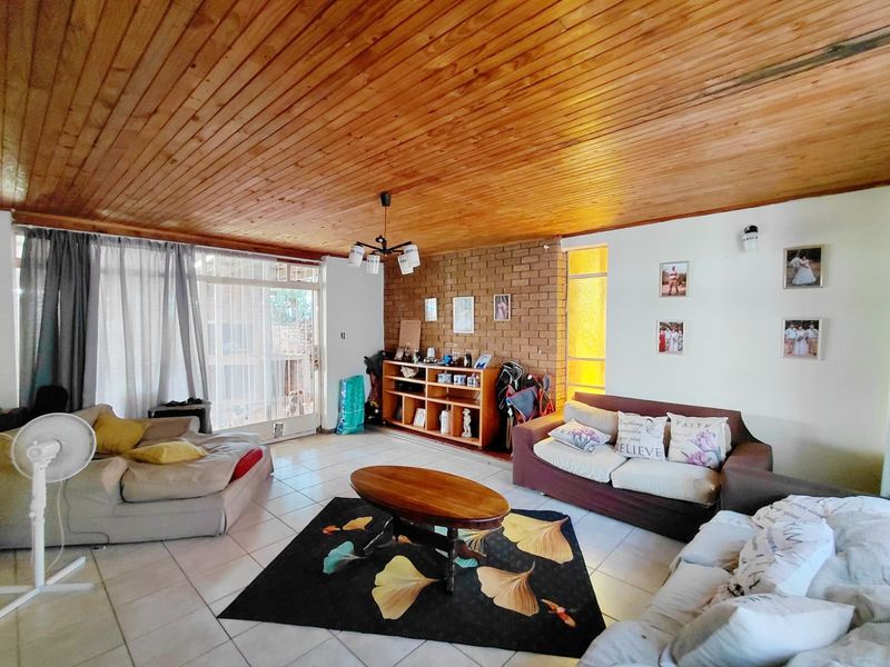 Spacious 4-Bedroom Home with Great Potential & Large Yard - Photo 2