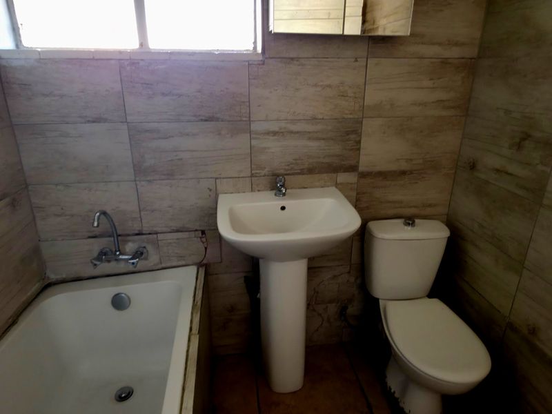 Sophisticated Two-Bedroom Residence with Private Garage - Photo 5