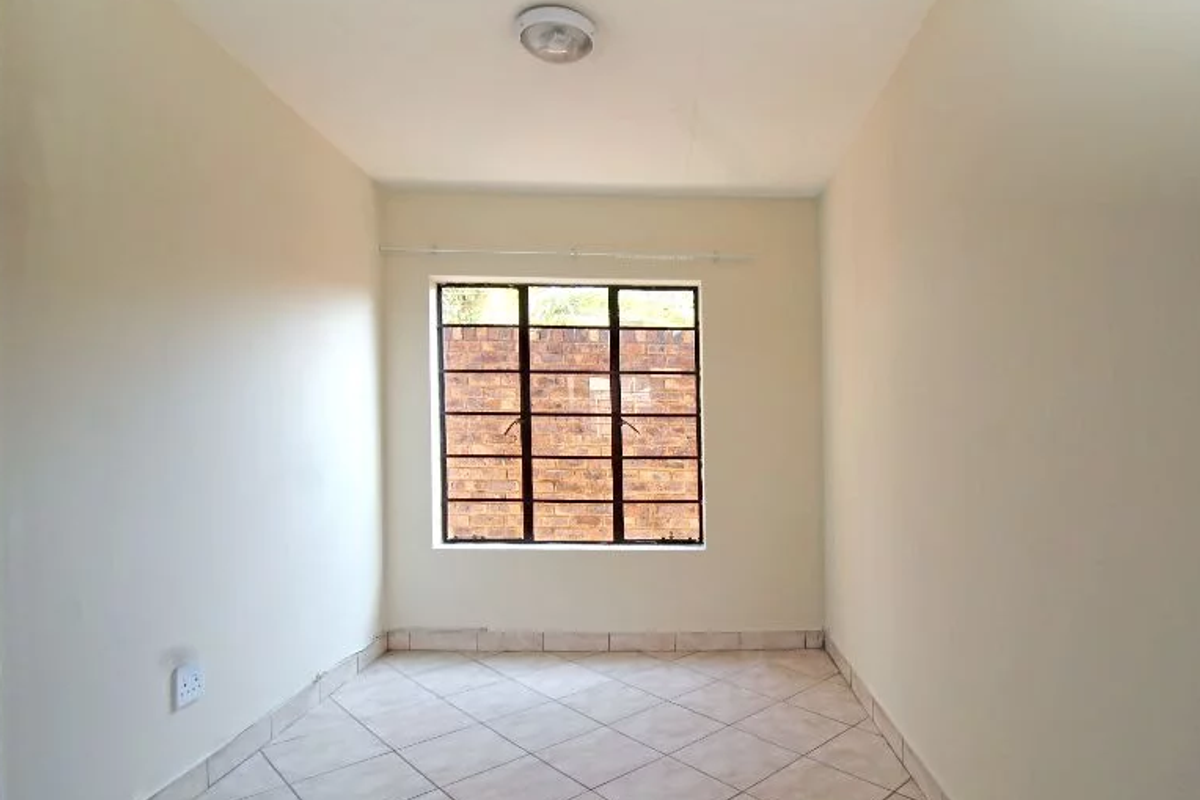 Welcome to Genesis Apartments—modern, affordable living in the vibrant heart of Kempton Park. - Photo 4