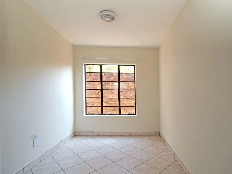 Welcome to Genesis Apartments—modern, affordable living in the vibrant heart of Kempton Park. - Photo 4