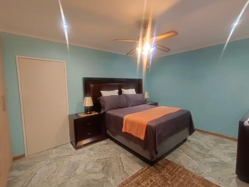 Spacious 4-Bedroom Townhouse with Modern Comforts - Photo 8