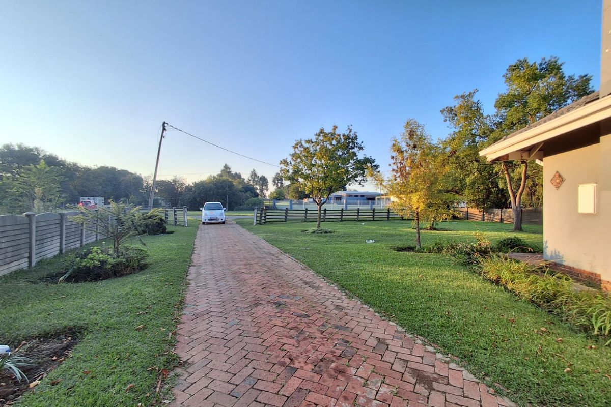 This property combines comfort and functionality with ample space indoors and outdoors. - Photo 3