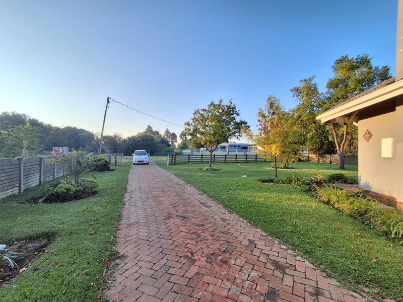 This property combines comfort and functionality with ample space indoors and outdoors. - Photo 3