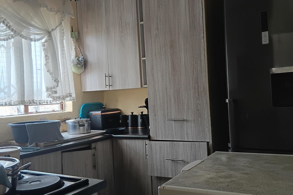 3-Bedroom Home with Spacious Yard and Future Investment Potential - Photo 4