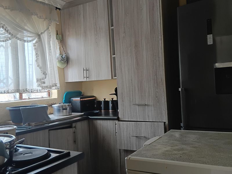 3-Bedroom Home with Spacious Yard and Future Investment Potential - Photo 4