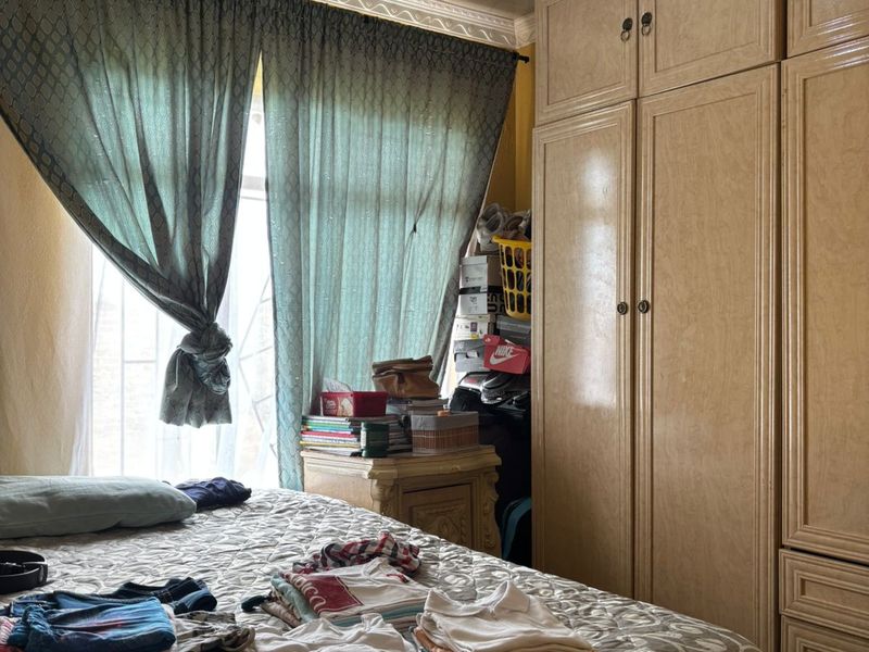 3-Bedroom Home with Spacious Yard and Future Investment Potential - Photo 8