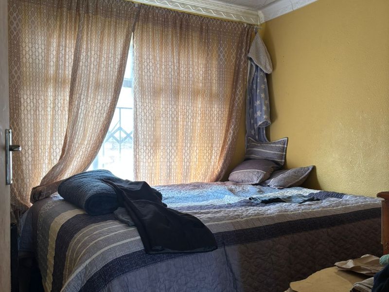 3-Bedroom Home with Spacious Yard and Future Investment Potential - Photo 7