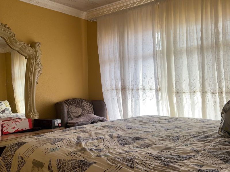 3-Bedroom Home with Spacious Yard and Future Investment Potential - Photo 6