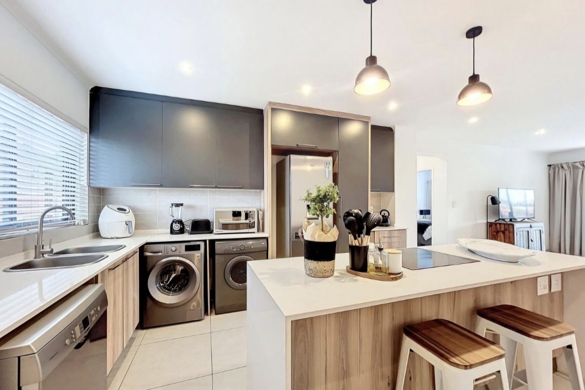 Elegant Three-Bedroom Simplex for Sale in Olive Wood Village South Estate - Photo 3