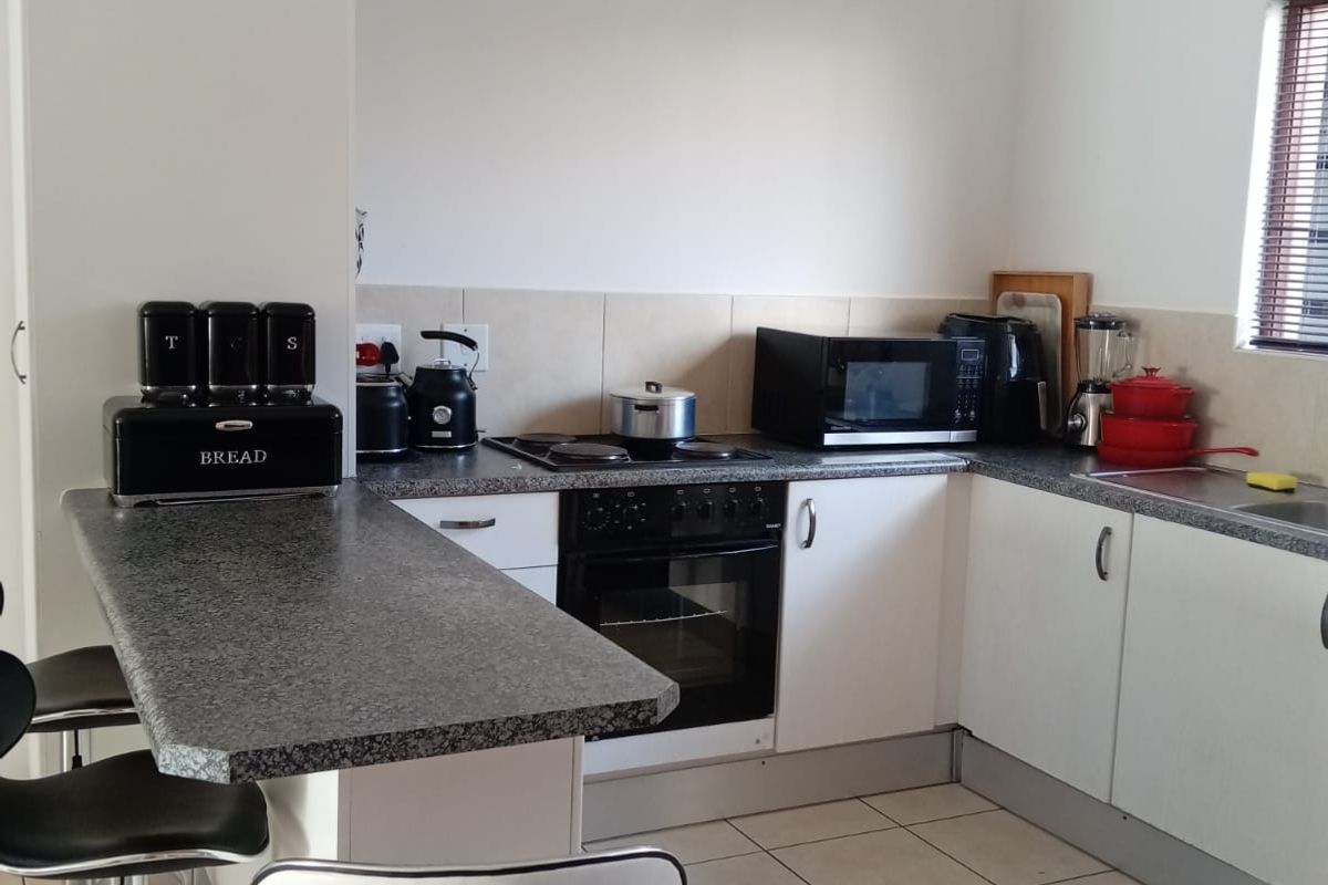 Step into comfort, convenience, and opportunity with this charming 2-bedroom townhouse. - Photo 3