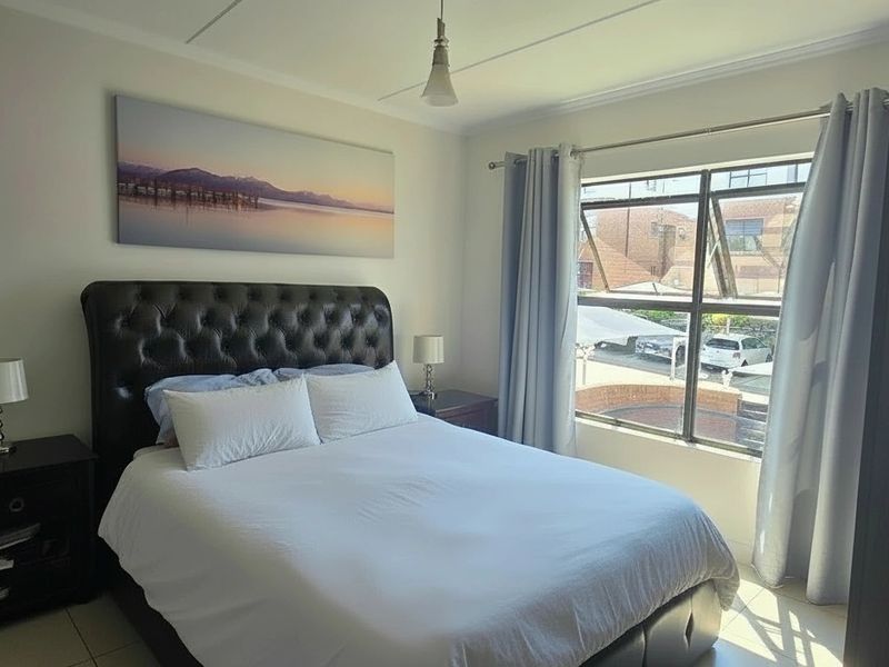 Step into spacious, modern living with this beautifully appointed first-floor apartment - Photo 4