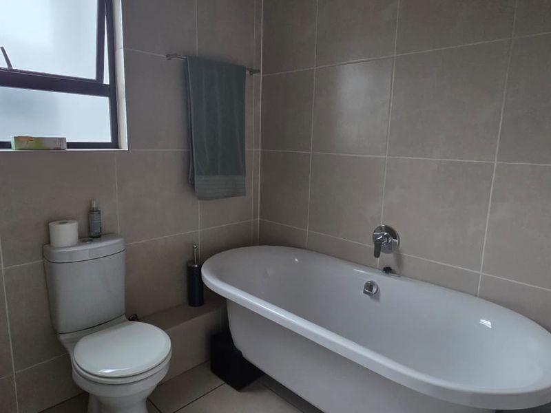 Step into modern, convenient living with this stylish first-floor apartment - Photo 9