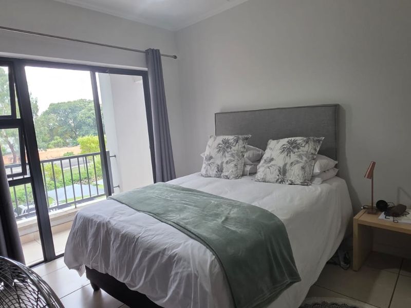 Step into modern, convenient living with this stylish first-floor apartment - Photo 7