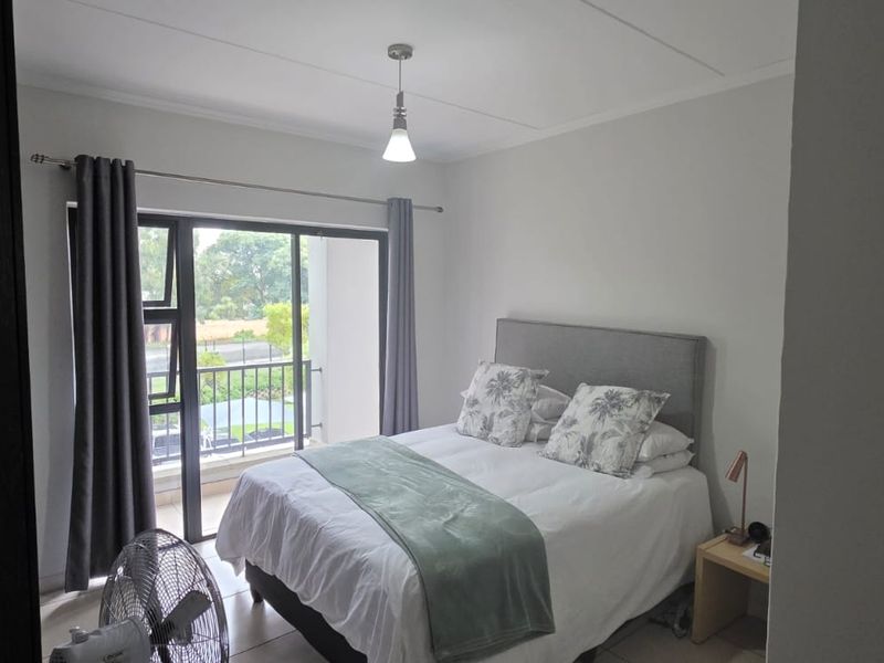 Step into modern, convenient living with this stylish first-floor apartment - Photo 8