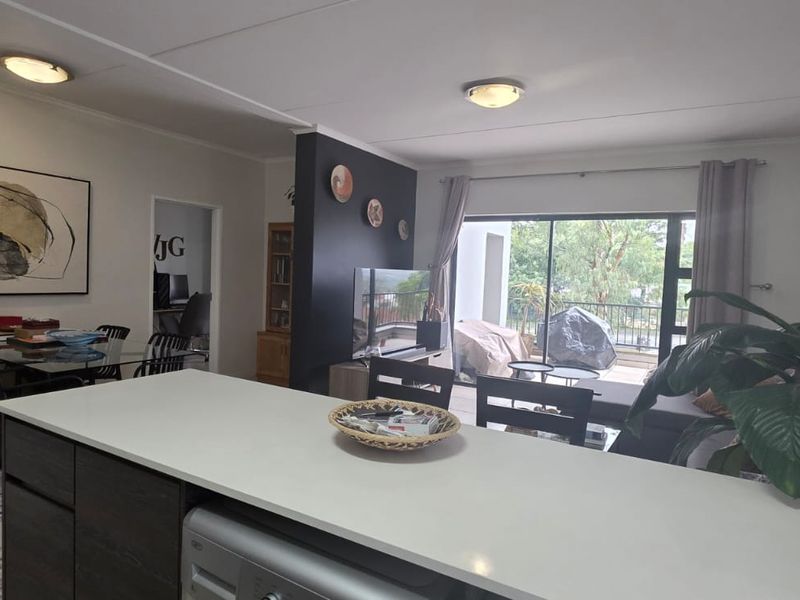 Step into modern, convenient living with this stylish first-floor apartment - Photo 6