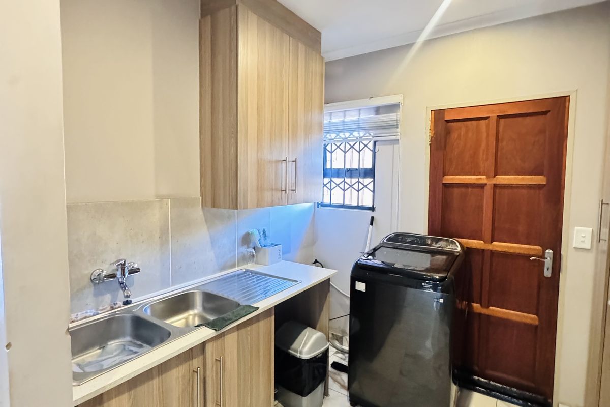 Modern 3-Bedroom Home in Secure Estate with Spacious Yard & Backup Water - Photo 3