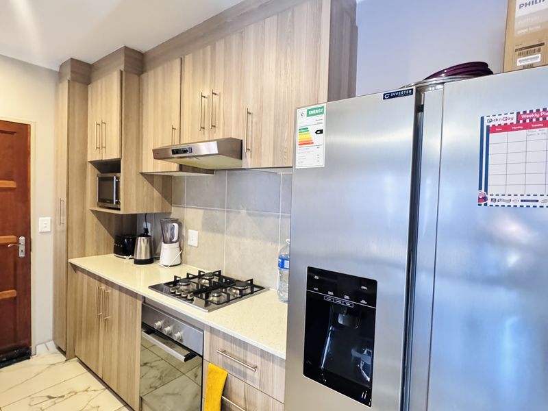 Modern 3-Bedroom Home in Secure Estate with Spacious Yard & Backup Water - Photo 2