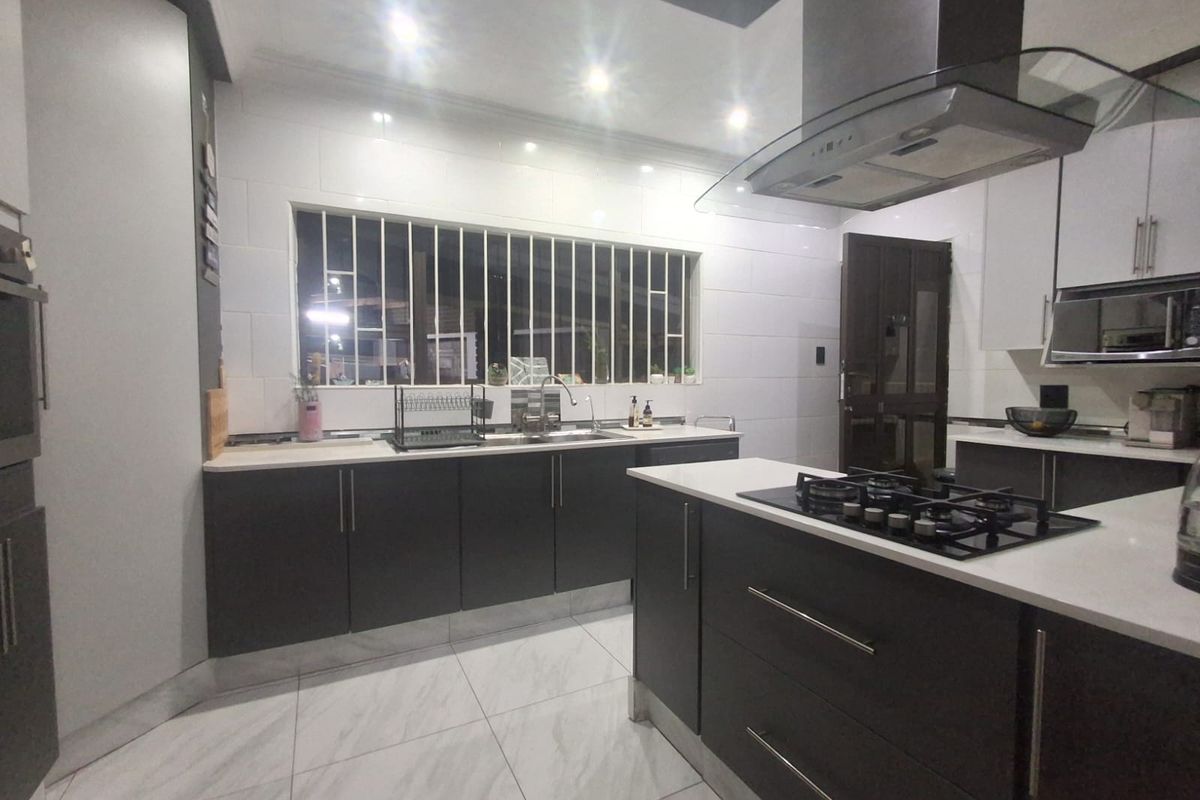 Neat-as-a-Pin 3-Bedroom Face brick Home with Granny Flat. - Photo 5