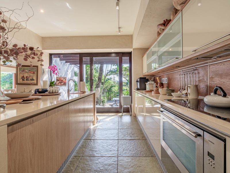 Ultra-Luxury 4-Bedroom Zimbali Home with Panoramic Views & Designer Living - Photo 7