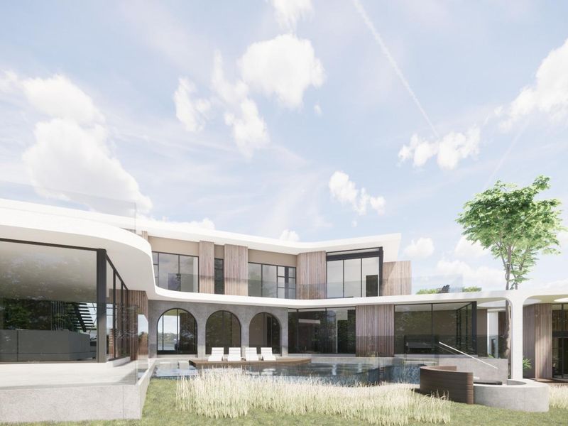 A modern architectural rear elevation featuring a swimming pool, expansive glass walls, timber cladding, and elegant arched stone detailing.