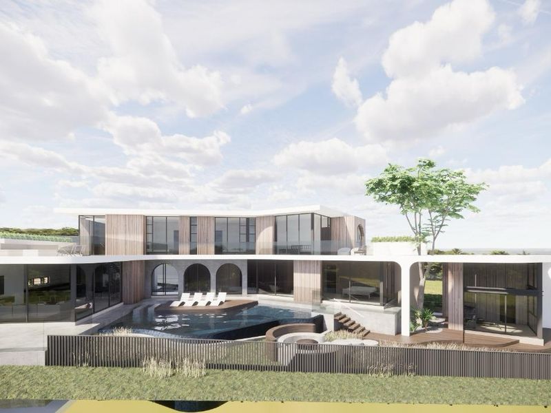 A modern architectural rendering of a luxury residence featuring a swimming pool, sunken seating area, and expansive glass facades.