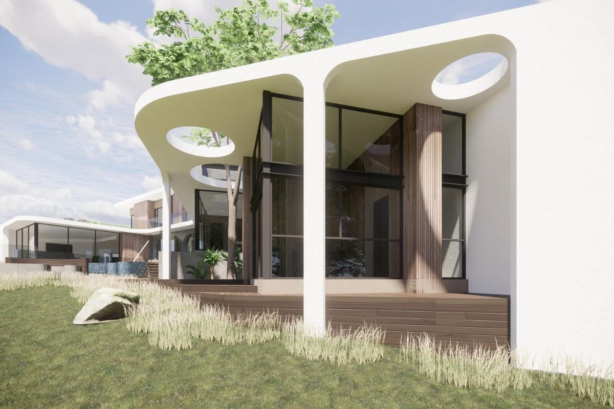 A modern architectural rendering of a rear exterior facade featuring a covered patio, timber decking, and expansive glass windows overlooking a landscaped yard.