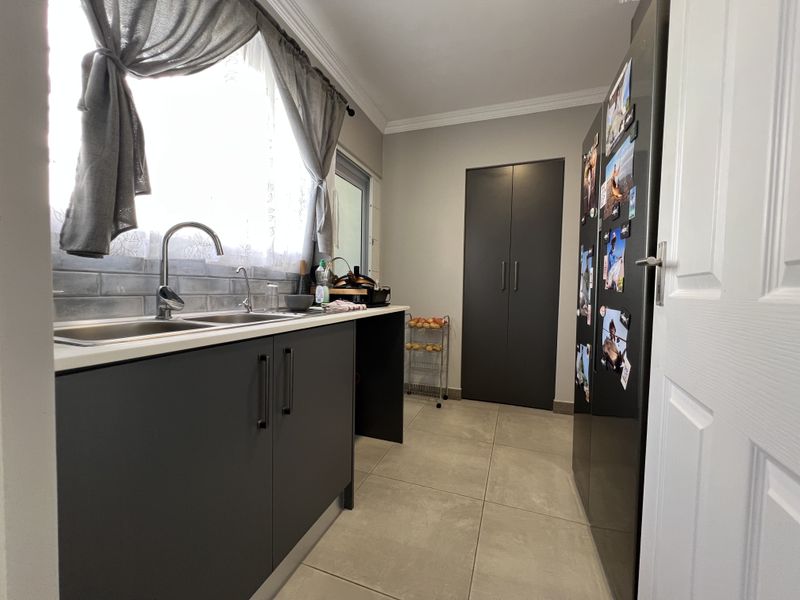 Secure and Modern Family home in neat condition - Photo 9
