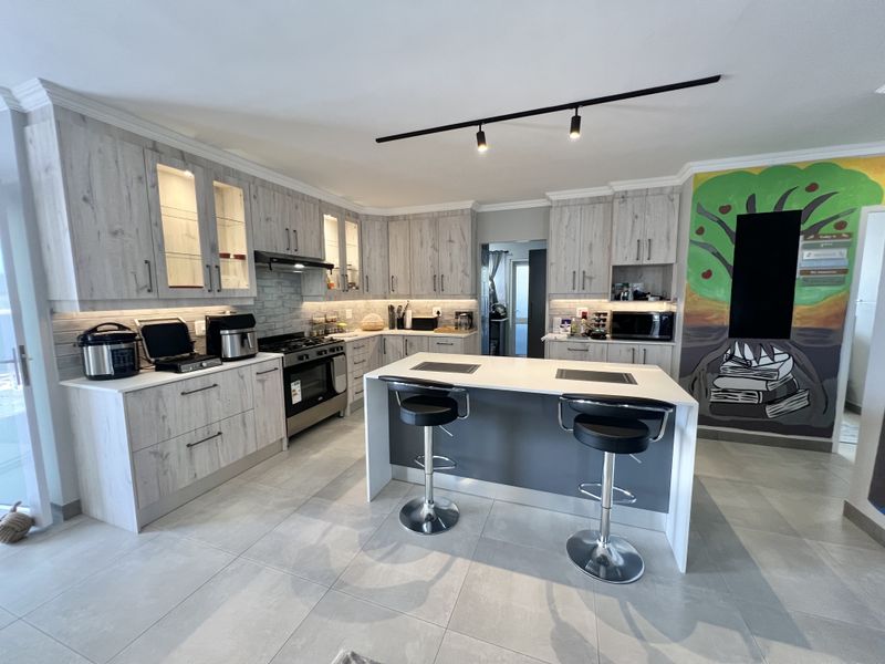 Secure and Modern Family home in neat condition - Photo 6