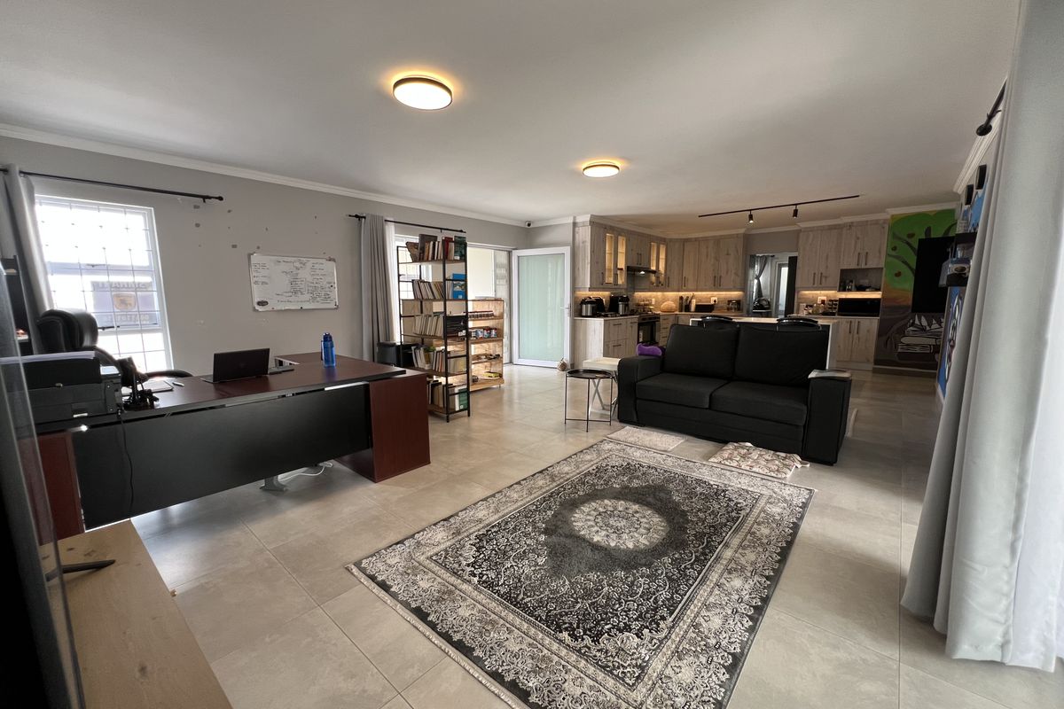 Secure and Modern Family home in neat condition - Photo 2