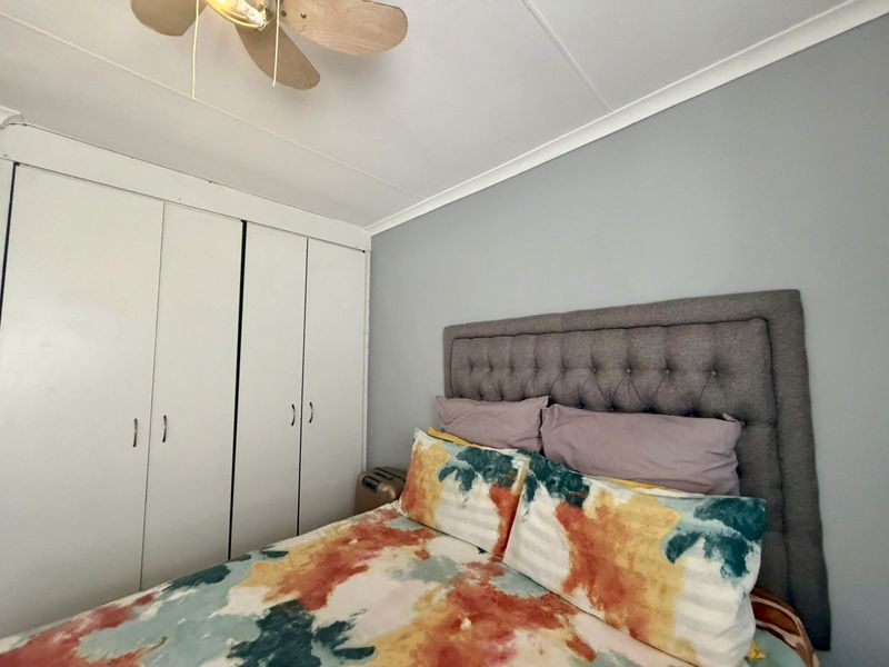 Charming 2-Bedroom Apartment in Secure Complex – Central Village, Arboretum - Photo 10