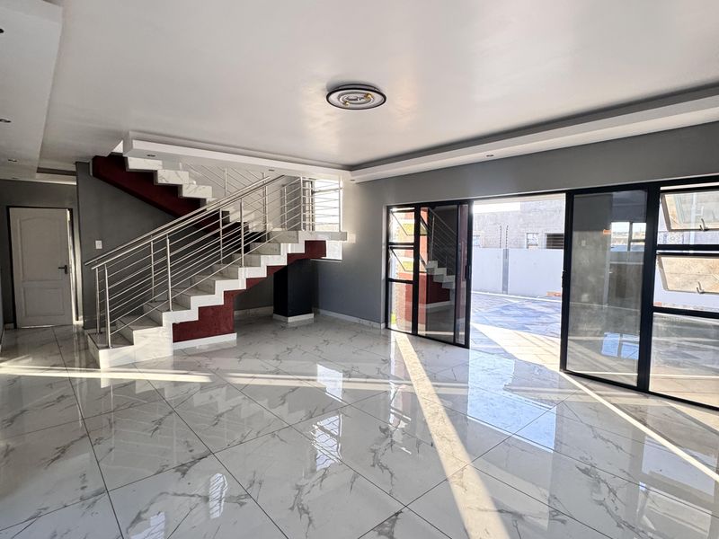 Modern Double-Storey Family Home with Pool & Stylish Entertainment Spaces - Photo 9