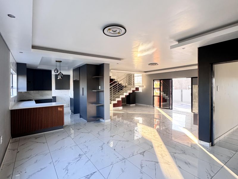 Modern Double-Storey Family Home with Pool & Stylish Entertainment Spaces - Photo 8